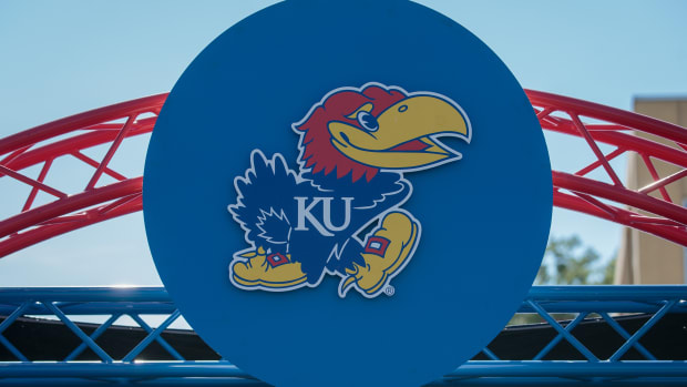 Oct 1, 2022; Lawrence, Kansas, USA; Kansas Jayhawks logo at entrance to the field prior to the game between the Kansas Jayhawks and the Iowa State Cyclones at David Booth Kansas Memorial Stadium. Mandatory Credit: William Purnell-USA TODAY Sports